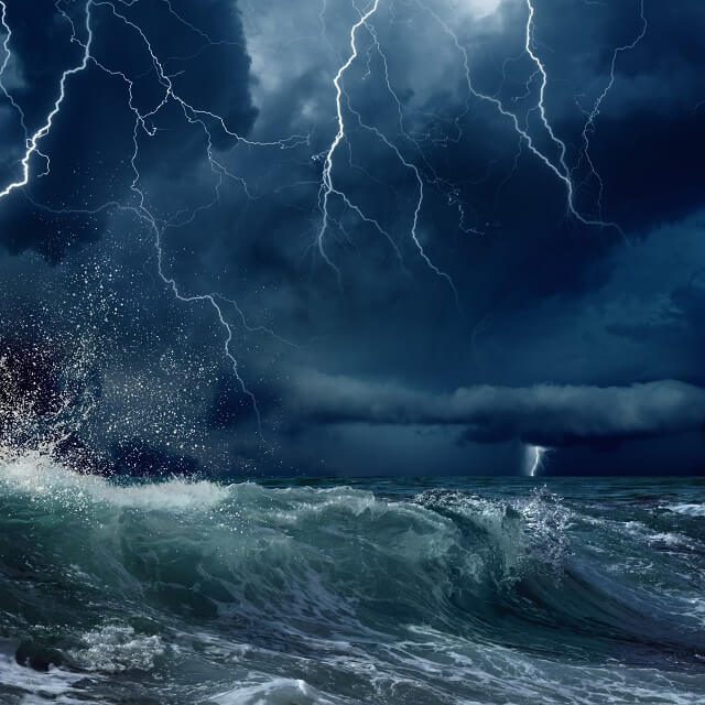 Nature force background - stormy sea, dark clouds with bright lightnings